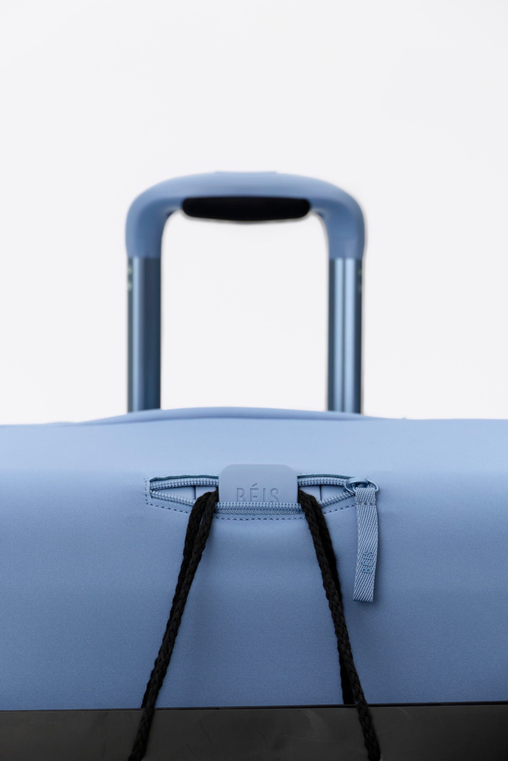 The Hybrid Check-In Luggage Cover in Dusty Blue - Image 6
